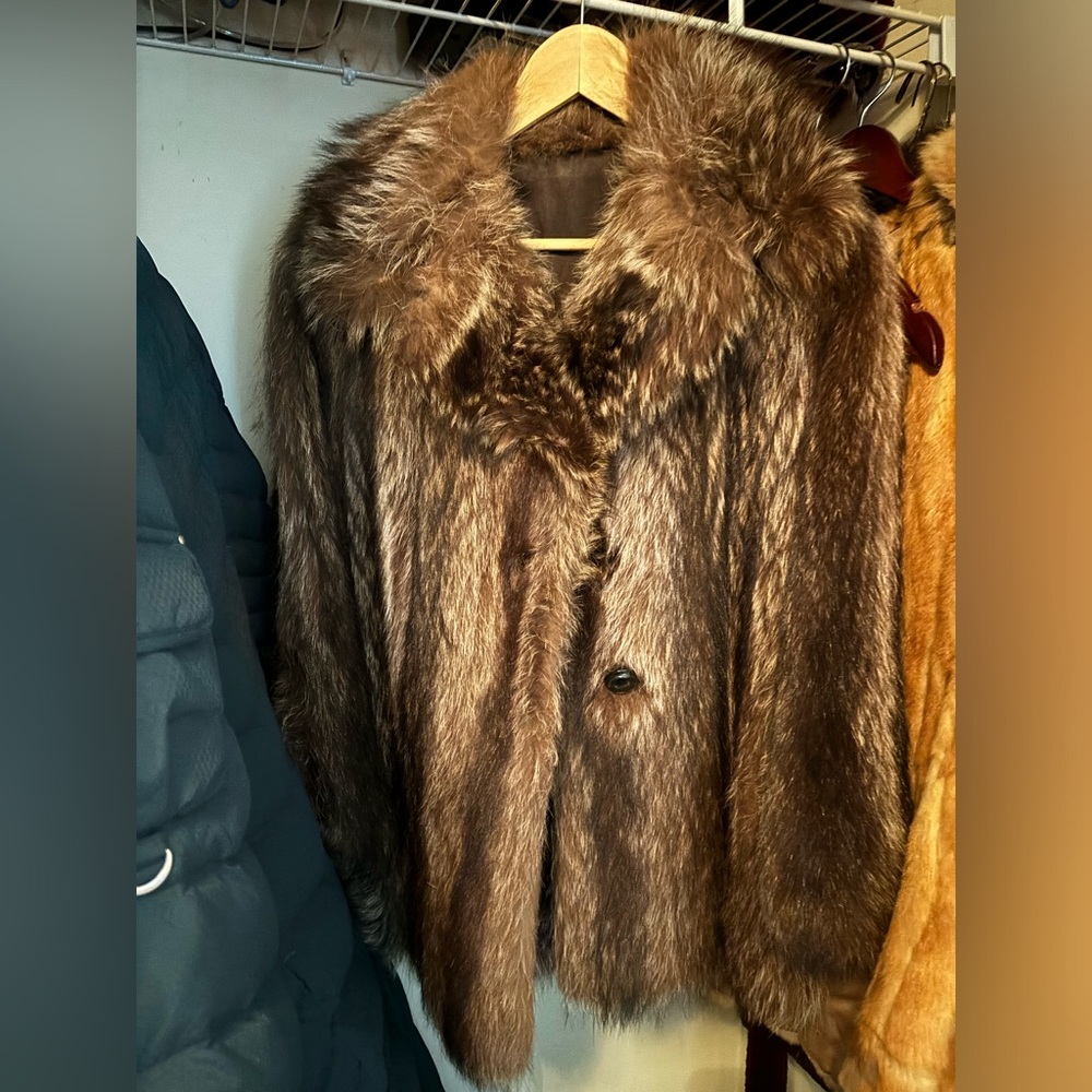Real fur coat. Excellent condition bought in Paris.